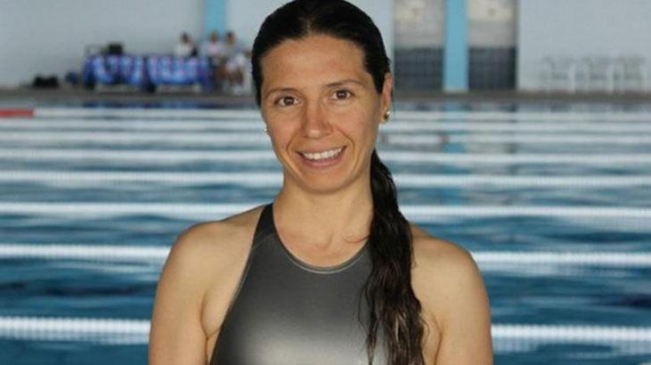 Rekortmen sporcu, madalyasını 10 aylık bebeğiyle aldı