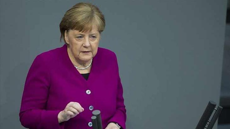 Merkel'den 'Corona virüs salgınıyla uzun süre yaşamak zorunda kalacağız' uyarısı