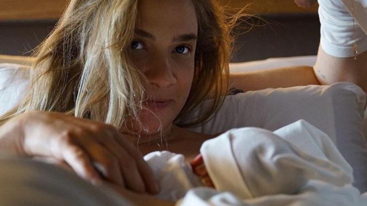 Caner Erdeniz ve Müge Boz'dan kızları Vina'yla ilk fotoğraf
