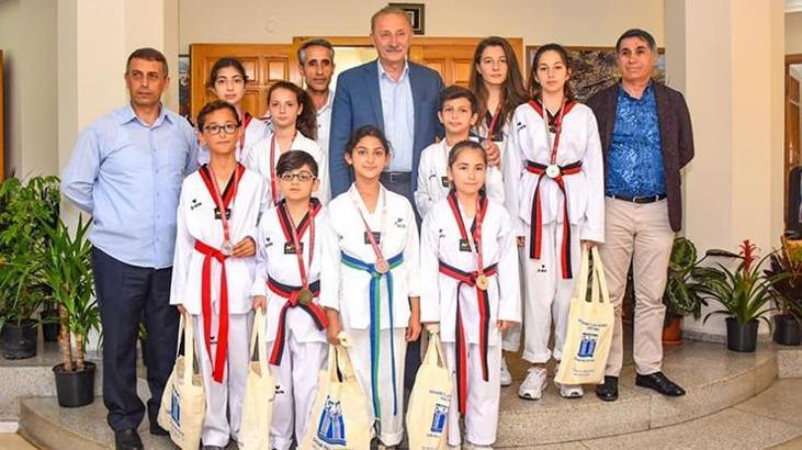 Tekvandocular başarılarını Başkan Atabay ile paylaştı