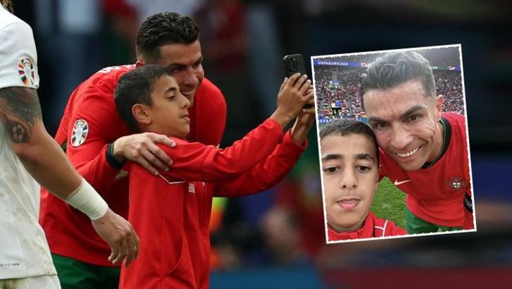 Ronaldo'yla selfie pahalıya patladı! Portekiz maçında sahaya atlayan Berat Uluğ için UEFA'dan şok karar