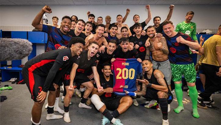 Barcelona won the La Liga title with a derby victory over Espanyol
