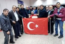 Dünya şampiyonu bilek güreşçi Gökhan Seven, Erzurum'da çiçeklerle karşılandı