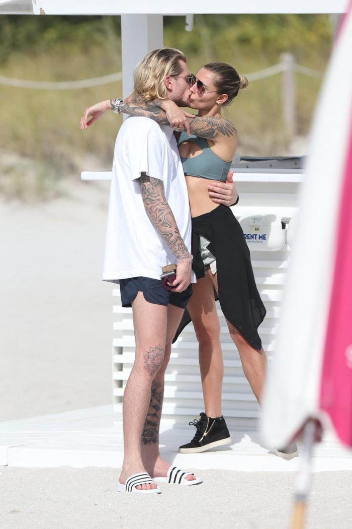 Otel aşıkları Loris Karius ve Sophia Thomalla görüntülendiklerini fark edince gizlendi