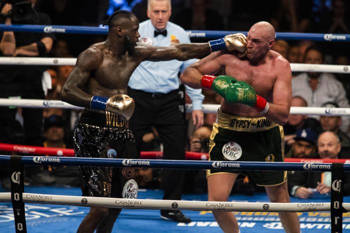 Deontay Wilderla berabere kalan Tyson Furynin yüzü savaş alanı gibi