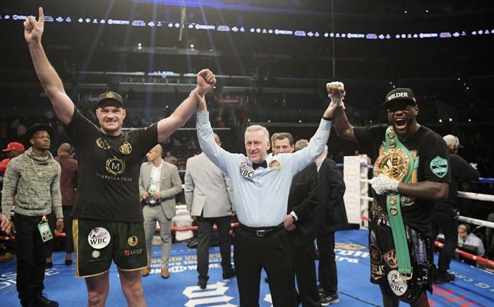 Deontay Wilderla berabere kalan Tyson Furynin yüzü savaş alanı gibi