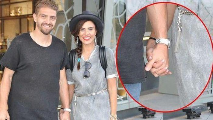 Caner Erkin Şükran Ovalı çifti el ele