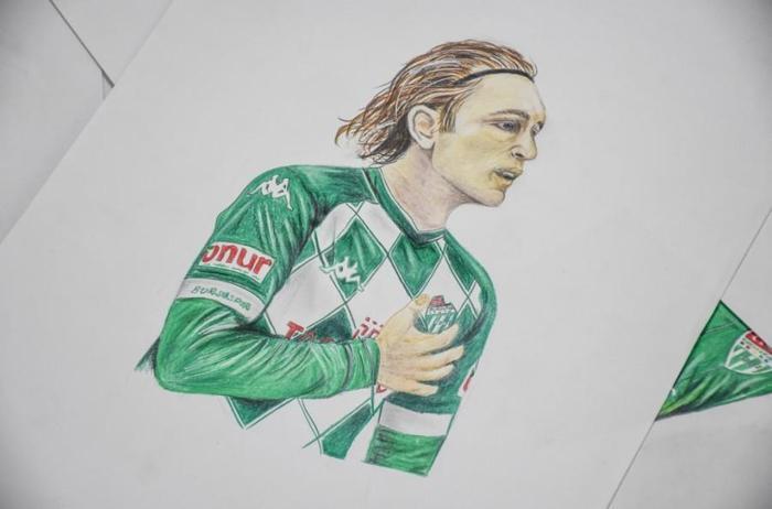 Kara kalem çizimleriyle genç sporculara destek olmayı hedefliyor