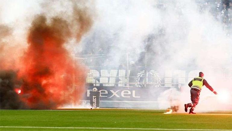 İsveçte takımları küme düşen taraftalar sahayı yaktı